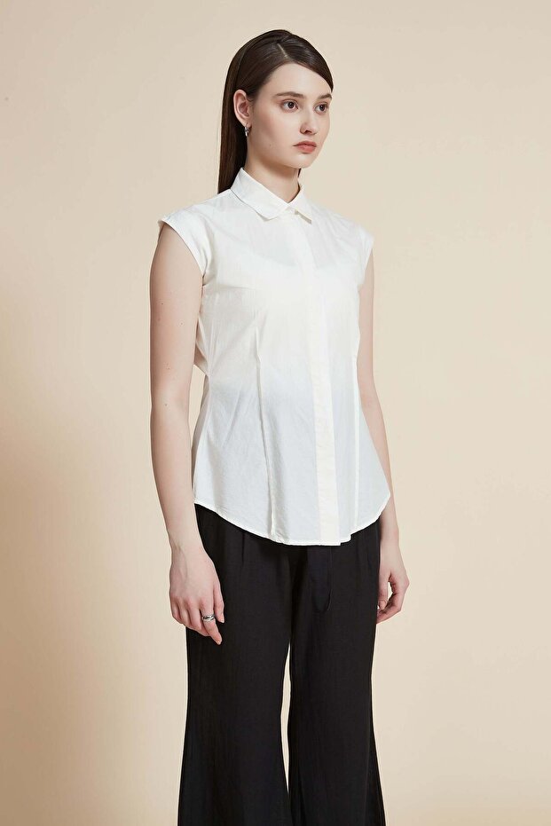 بلوزة سادة بدون أكمام - 3