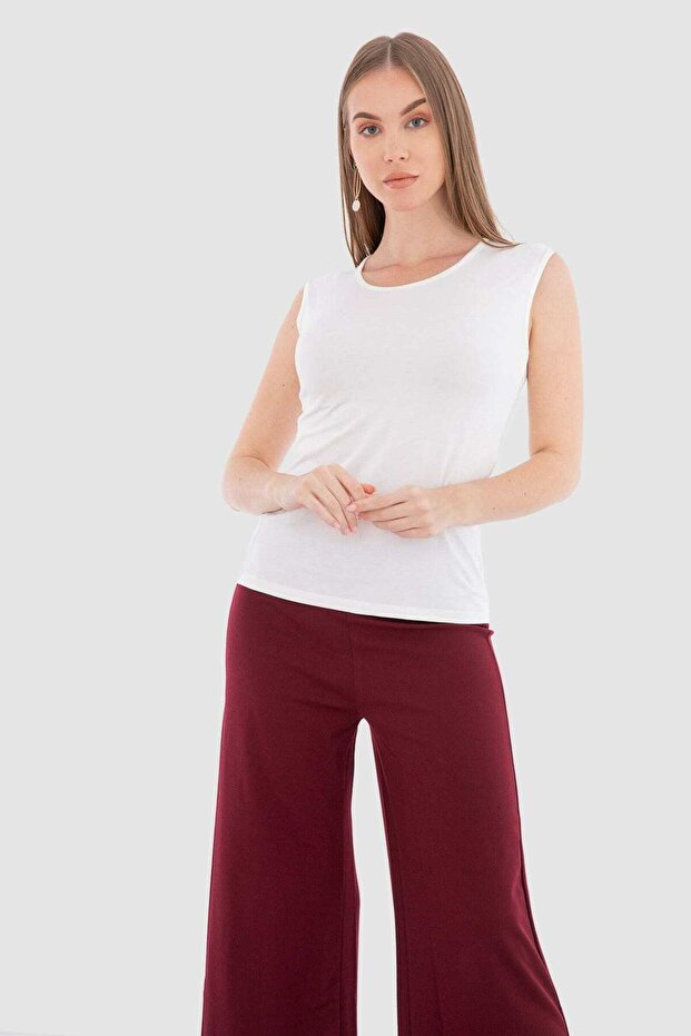 بلوزة سادة بدون أكمام ورقبة مستديرة - 1