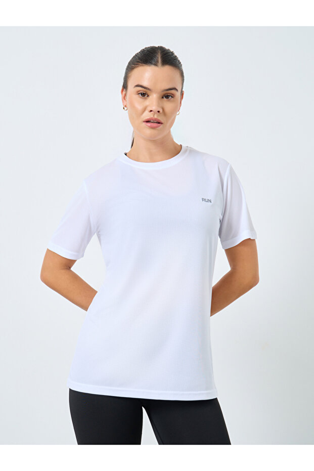 بلوزة أساسية بأكمام قصيرة مع نص عاكس - 1