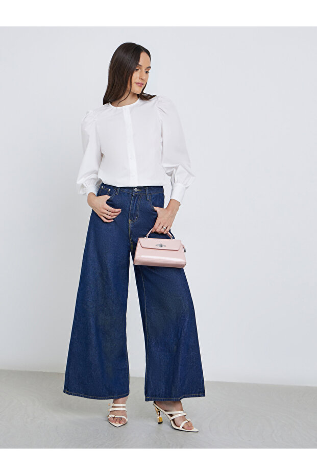 بلوزة سادة بأكمام منفوخة وأزرار - 2