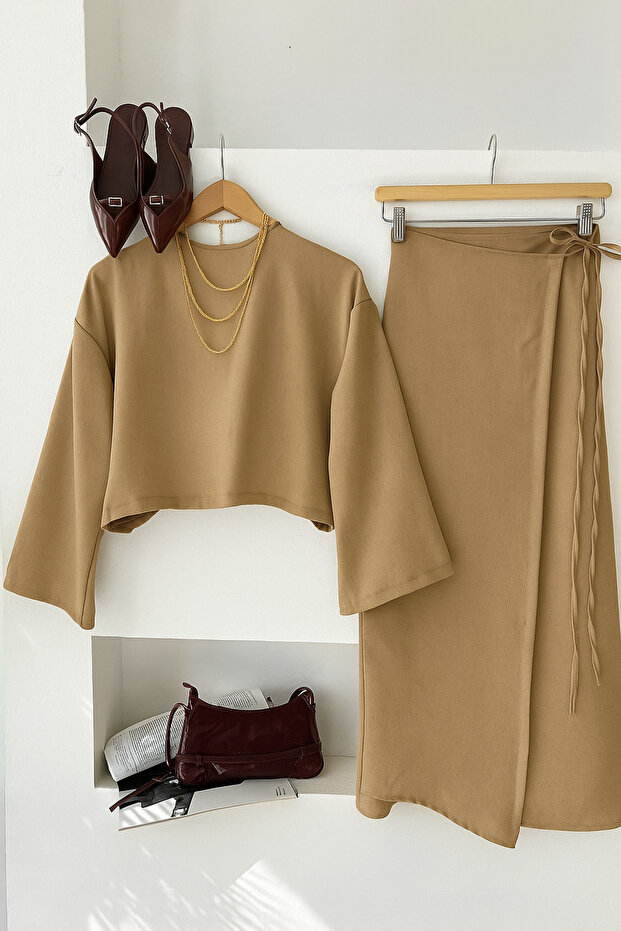 طقم نسائي مكون من كتان قطع: بلوزة وتنورة طويلة بخصر مطاطي، طقم صيفي محتشم - 1