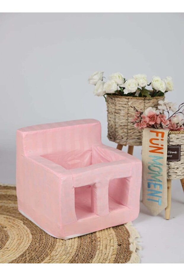 A comfortable foam chair specially designed to help babies learn to sit. - 3