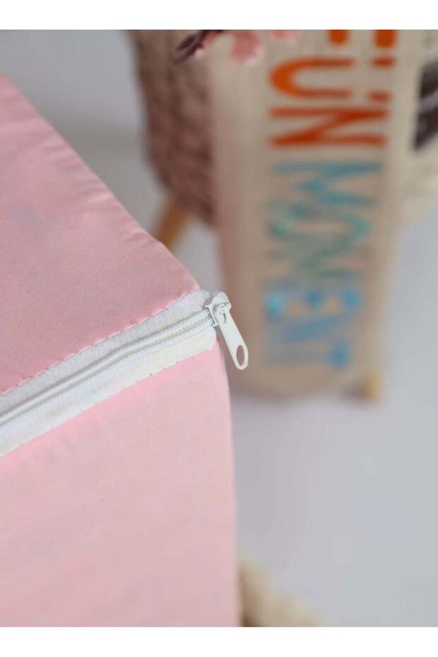 A comfortable foam chair specially designed to help babies learn to sit. - 2