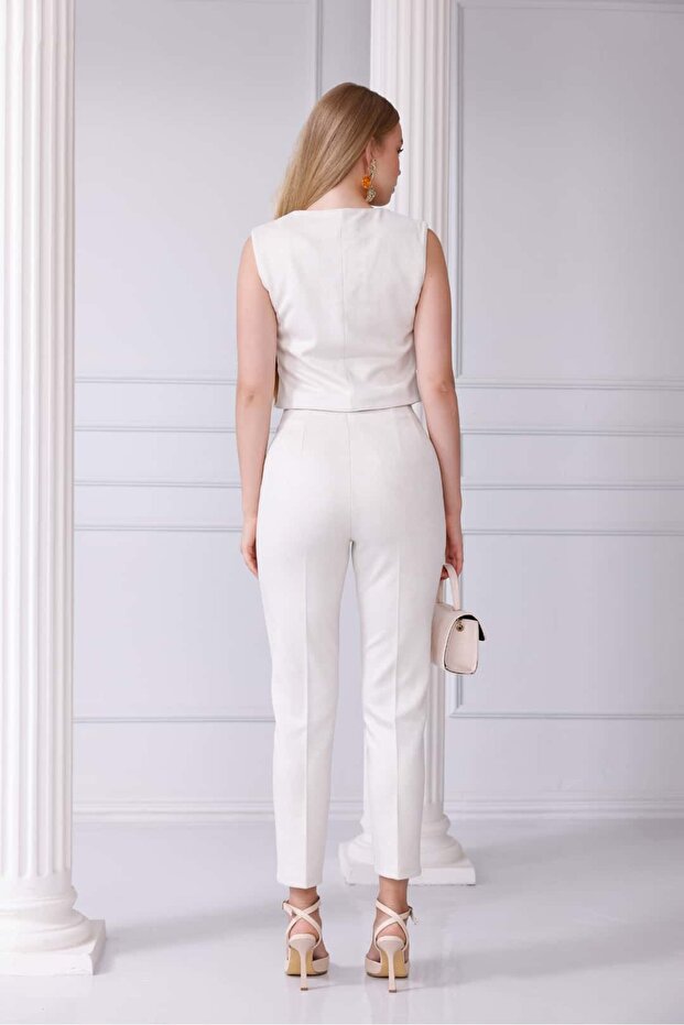 بدلة سترة بأزرار مع إكسسوارات من جلد الغزال - 4