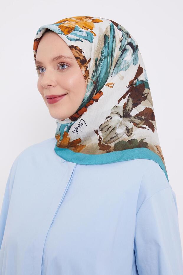 وشاح حريري بنمط تجريدي باللون الفيروزي - 1