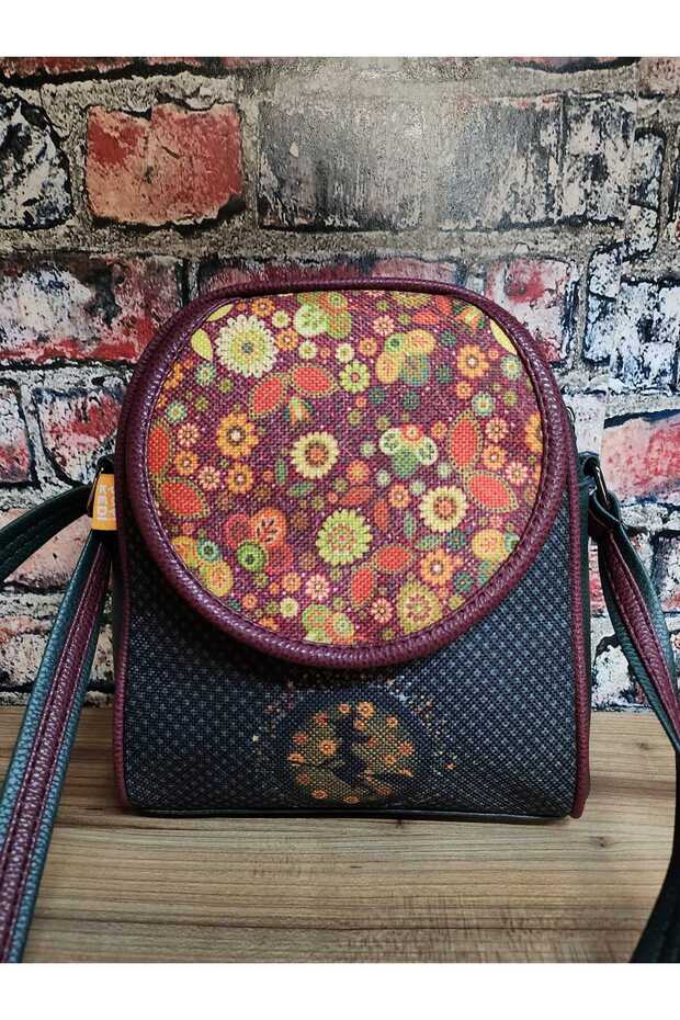 حقيبة كتف منقوشة من كادي - 1