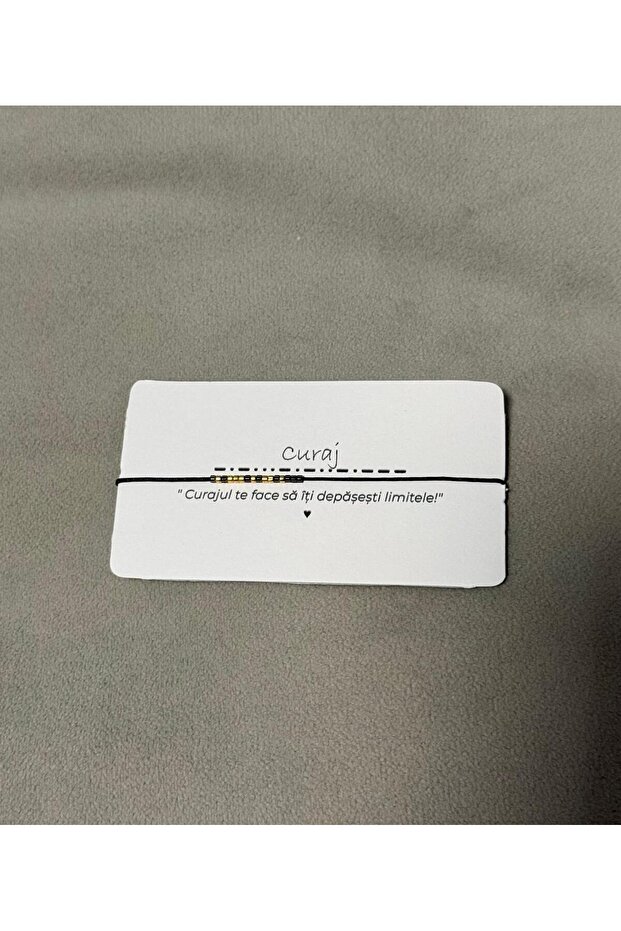 Adjustable bracelet on black cord with Morse code message: Courage - 1