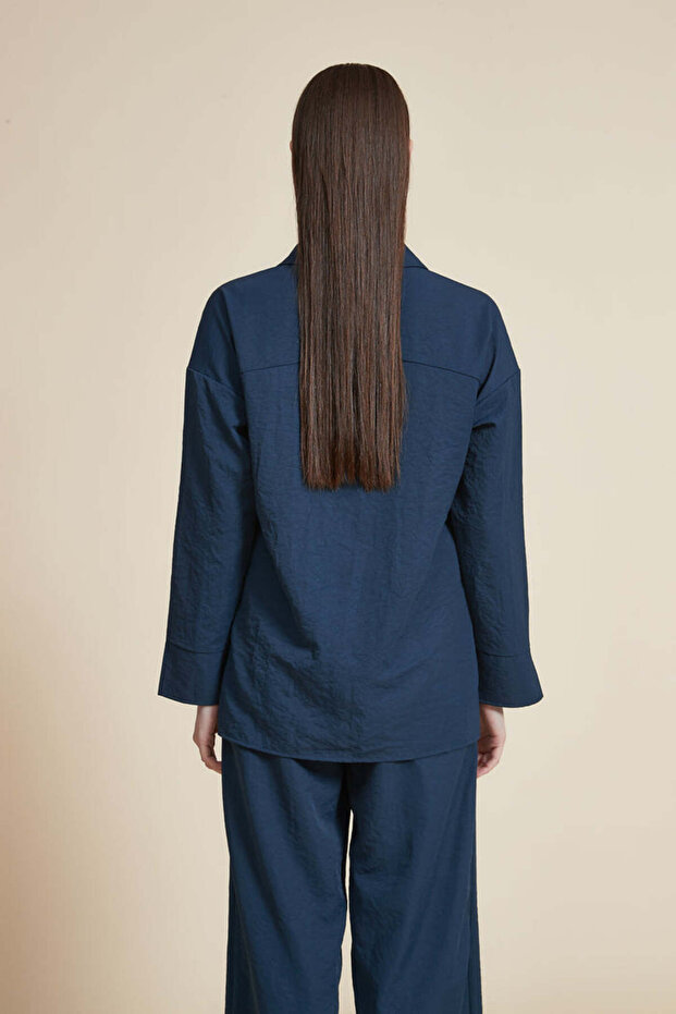 بلوزة سادة بطول الخصر وأكمام واسعة - 2