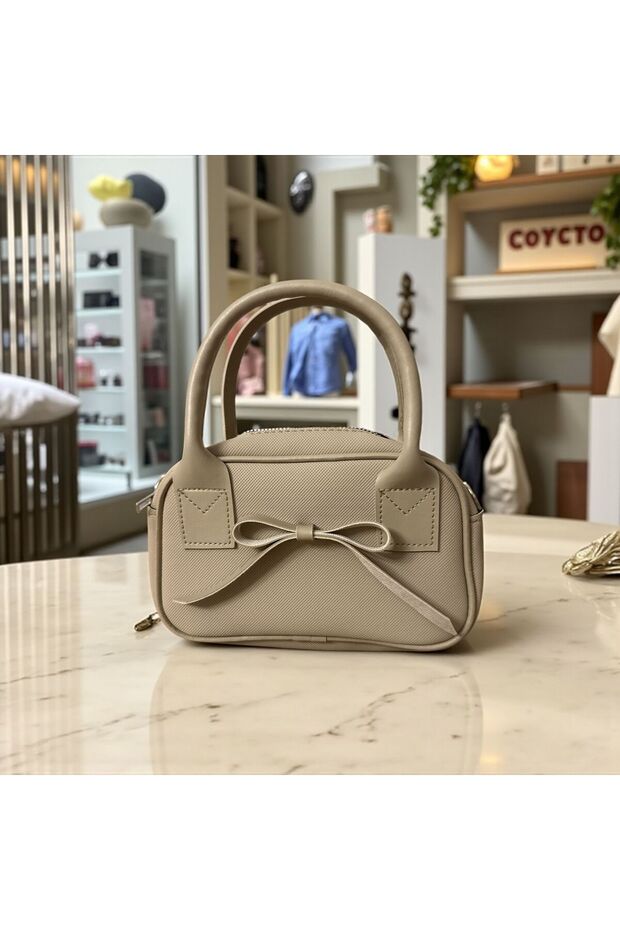 حقيبة كتف نسائية بتصميم فيونكة