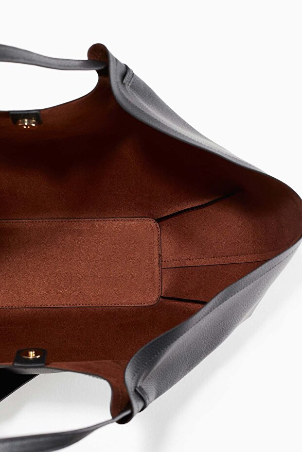 المتسوق مع الحقيبة - 1