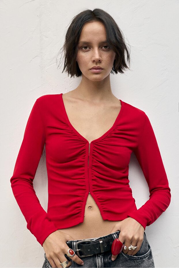 Uzun kollu çıtçıtlı top - 1