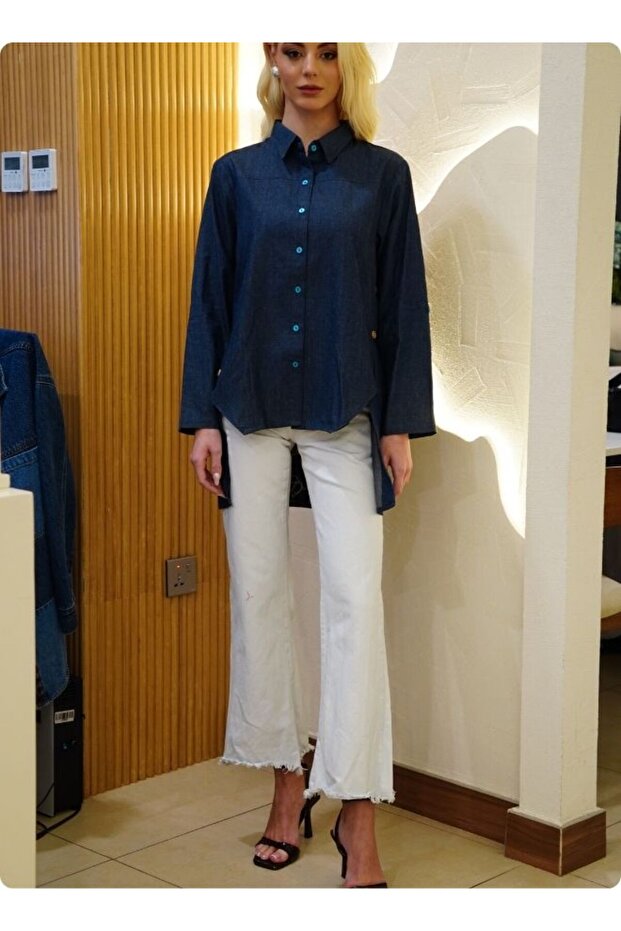 Denim blue in sturdy washed cotton shirt with collar and button down front