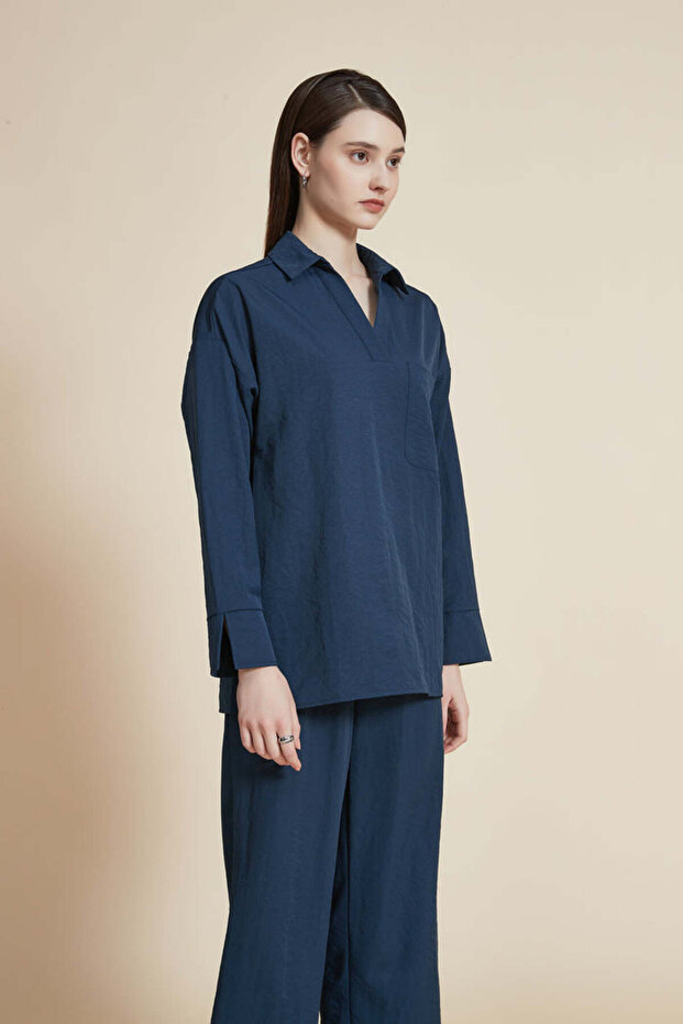 بلوزة سادة بطول الخصر وأكمام واسعة - 4