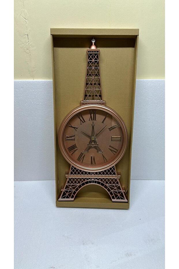 ساعة حائط بلاستيكية مع زجاج على شكل برج ايفل، متوفرة بلونين - 1