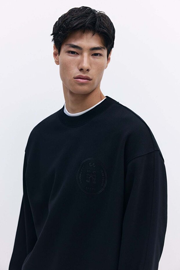 سويت شيرت مطبوع بمقاس عادي - 1