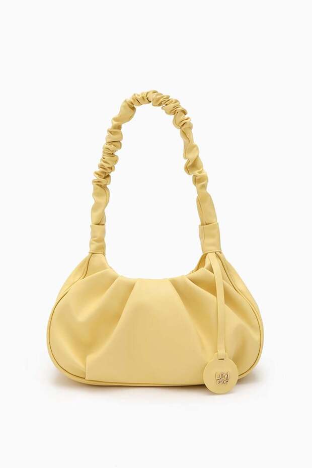 حقيبة كتف بحزام مطاطي أصفر - 1