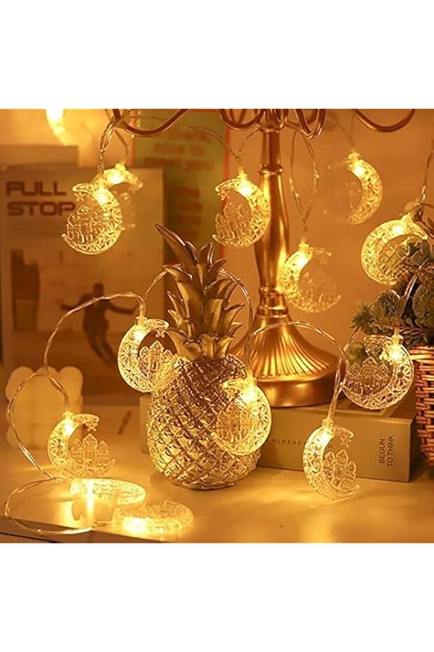 Eid al-Adha/Ramadan Star Moon Castle String Lights. Decorations for Eid, Ramadan, weddings, parties & home decor. Battery-powered with 2 lighting modes, emitting a warm white glow.