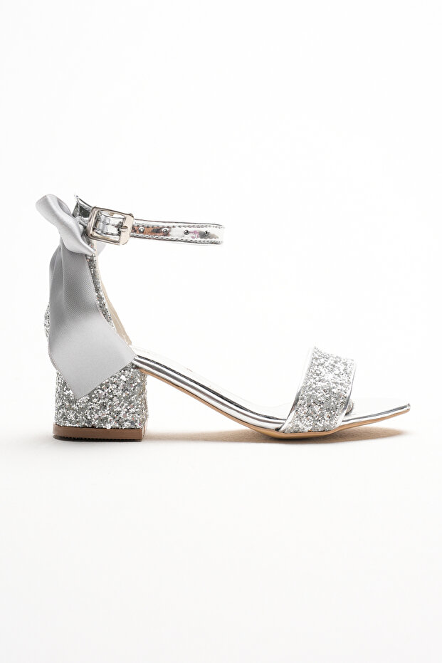 Silver Glassy Children's Shoes with a Bow on the Back