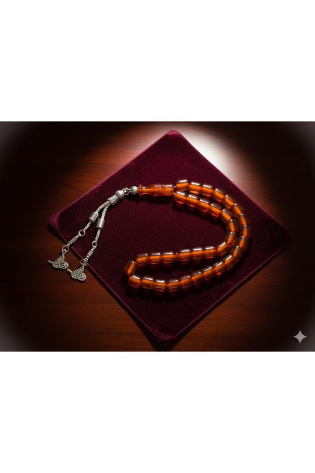 The Wonderful Harmony of the Stick-Shaped Amber Prayer Beads in the Colors of Honey and Amber.