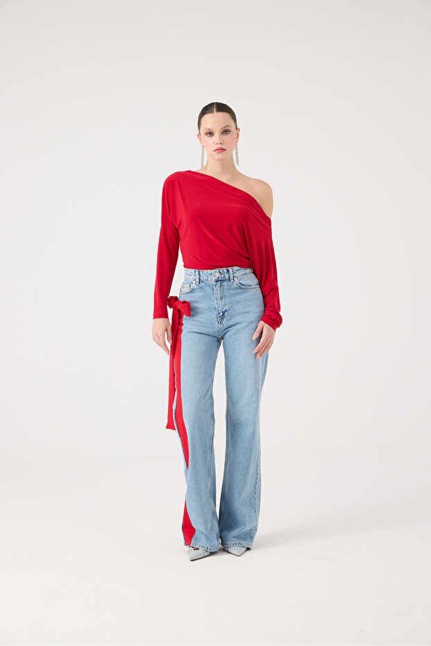 Jeansy z wysokim stanem i szerokimi nogawkami w kolorze niebieskim - 4