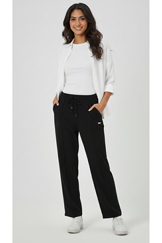 بنطلون بجيب وساق واسعة - 1