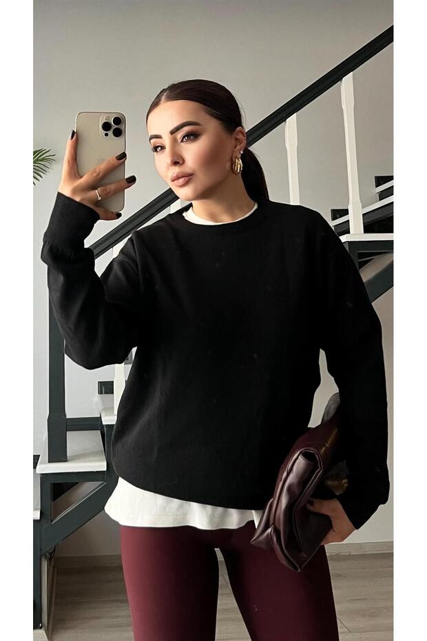 سترة أساسية من الصوف ذات ياقة دائرية باللون الأسود - 1