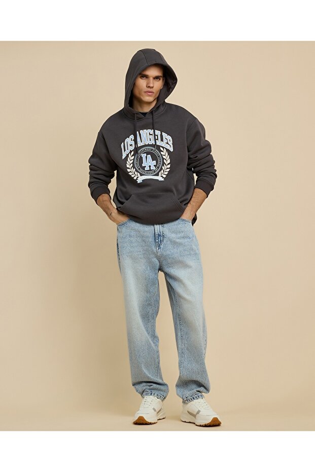 Faded Relaxed Fit Jeans with Button Closure