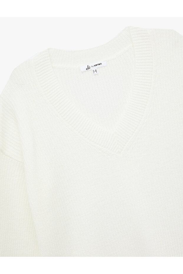 Langärmliger Strickpullover mit V-Ausschnitt - 5