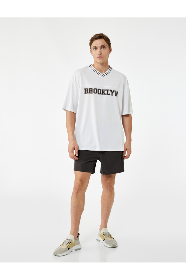 Parachute Fabric Oversize Elastic Waist Sports Shorts with Zippered Pockets and Slit Detail
