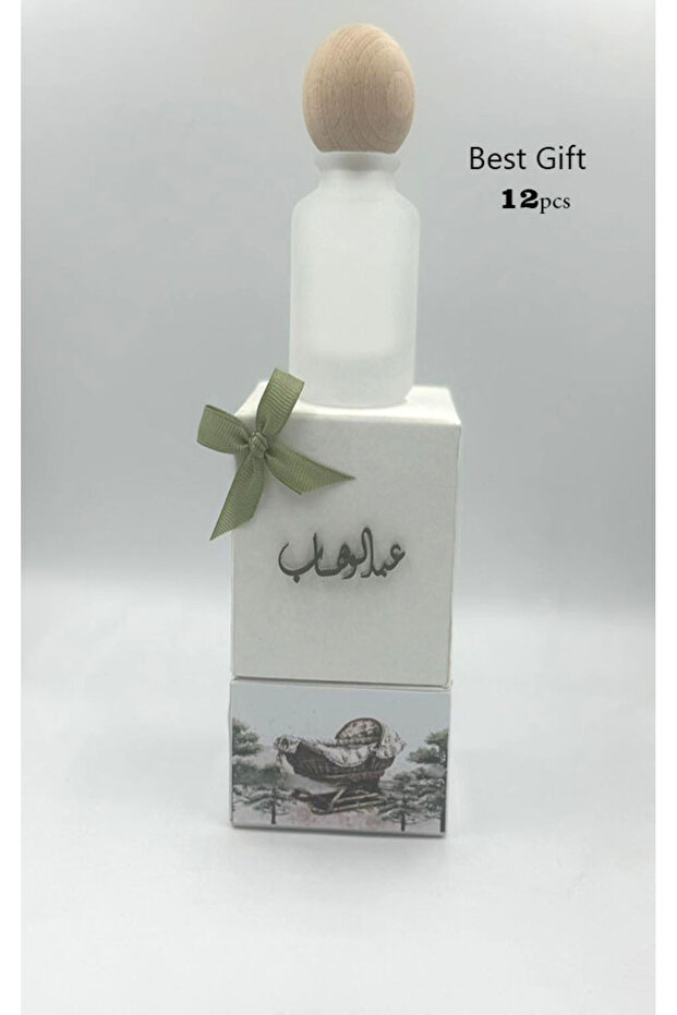 توزيعات عطر ميني مع العلبة والثيم والاسم حسب الطلب عدد 12 حبة