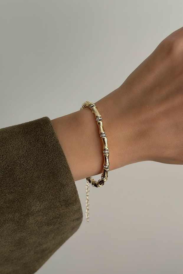 سوار على شكل عظمة مرصعة بالأحجار - 1