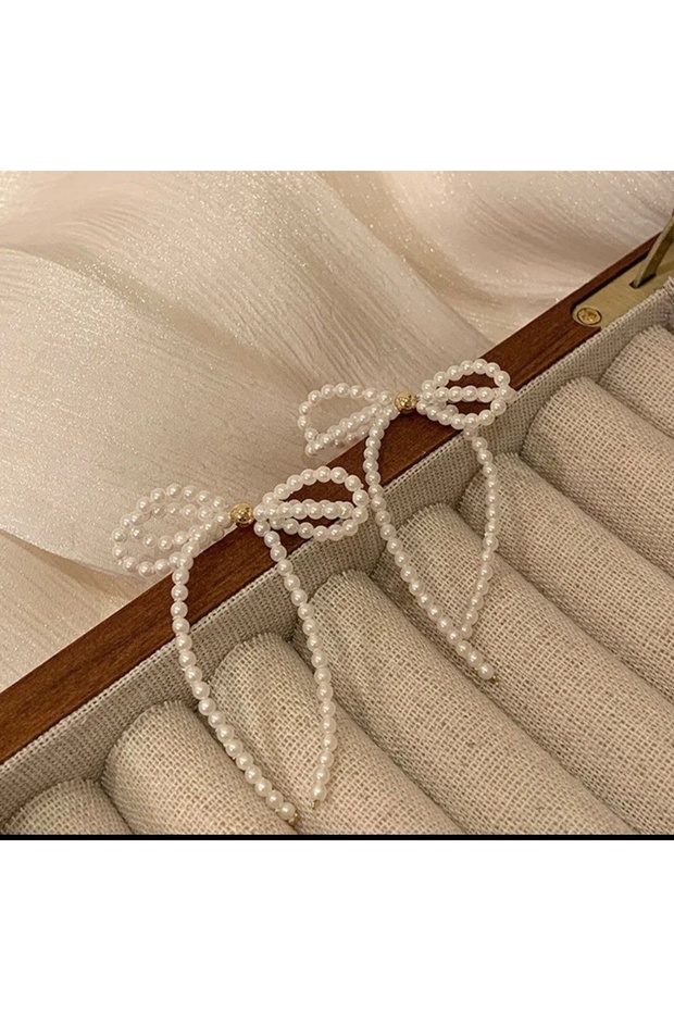 Bowknot Design Pearl Detailed Earrings That Complete Your Elegance