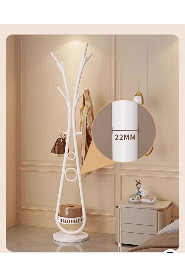 Modern clothes hanger with elegant artistic design and practical storage base - 3