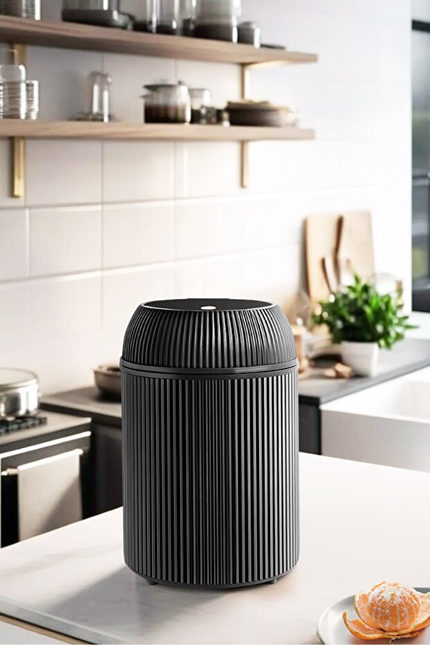 سلة مهملات دائرية سعة 10 لتر بغطاء قابل للطي باللون الأسود - 1