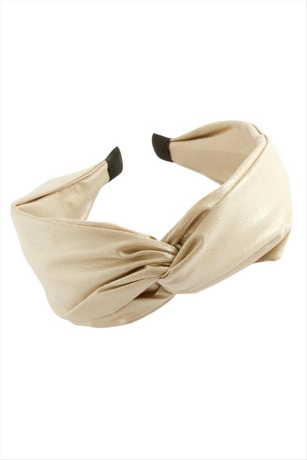 تاج من الجلد على شكل فيونكة - 1