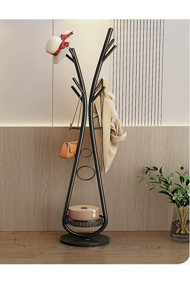 Modern clothes hanger with elegant artistic design and practical storage base - 2