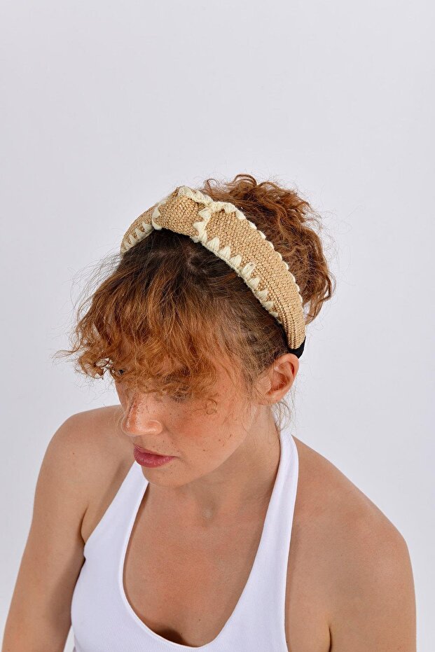 Woven crown with stitching detail