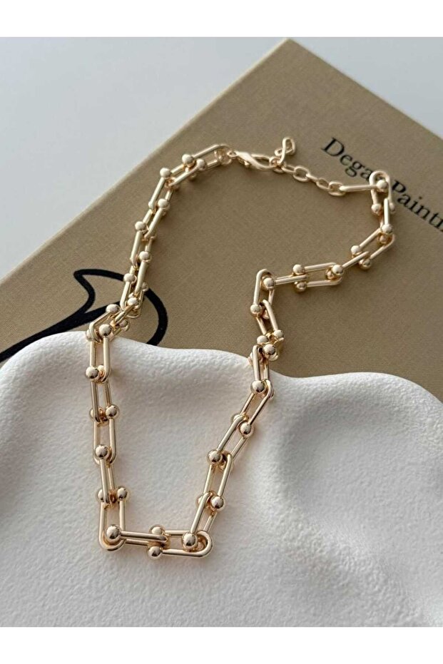 Çelik tiny gold küpe - 1