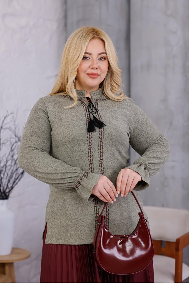 بلوزة ناعمة ذات كشكشة كبيرة الحجم - 1