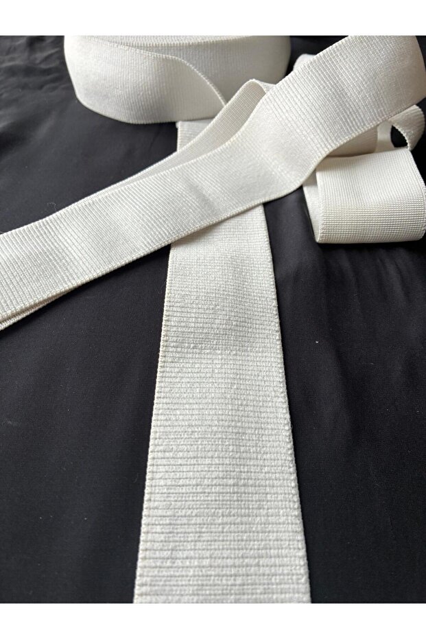 White Sequential Patterned Rubber Strip - 1