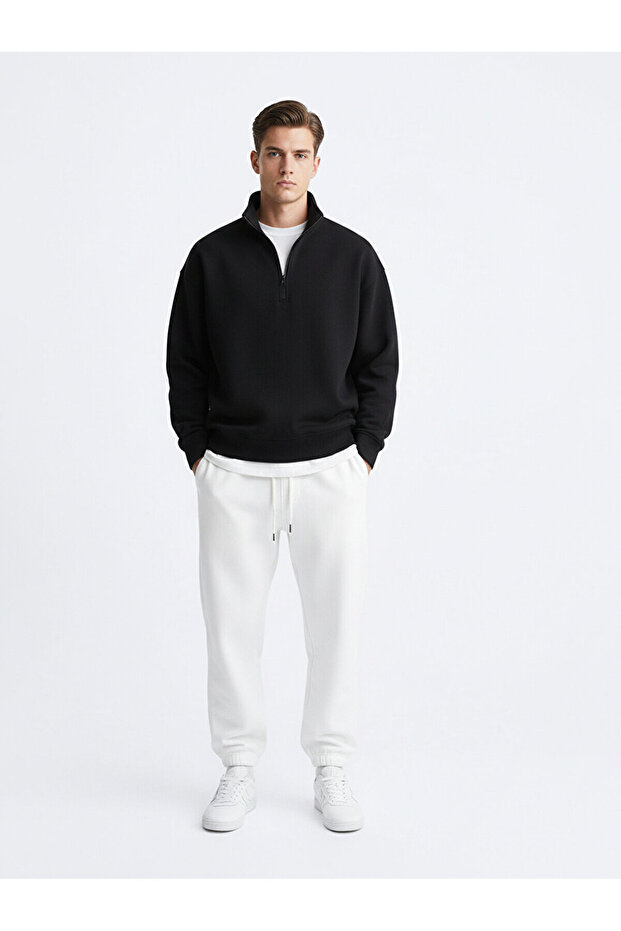 سترة رياضية سوداء أساسية بأكمام طويلة ونصف سحاب - 1