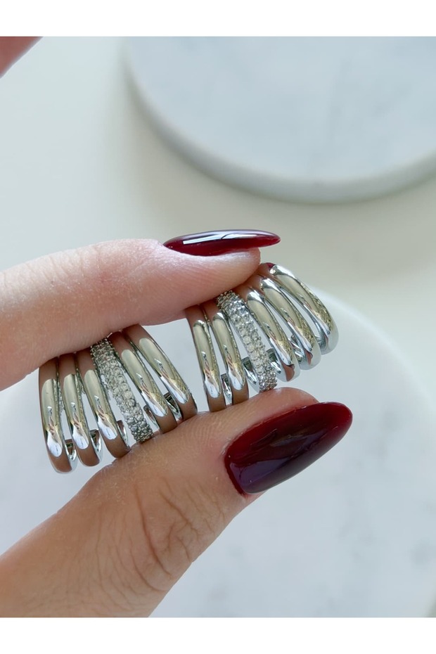 أقراط متعددة المظهر - 1