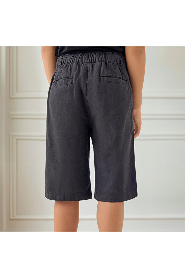 شورت منسوج سادة مع جيوب وإغلاق برباط - 3