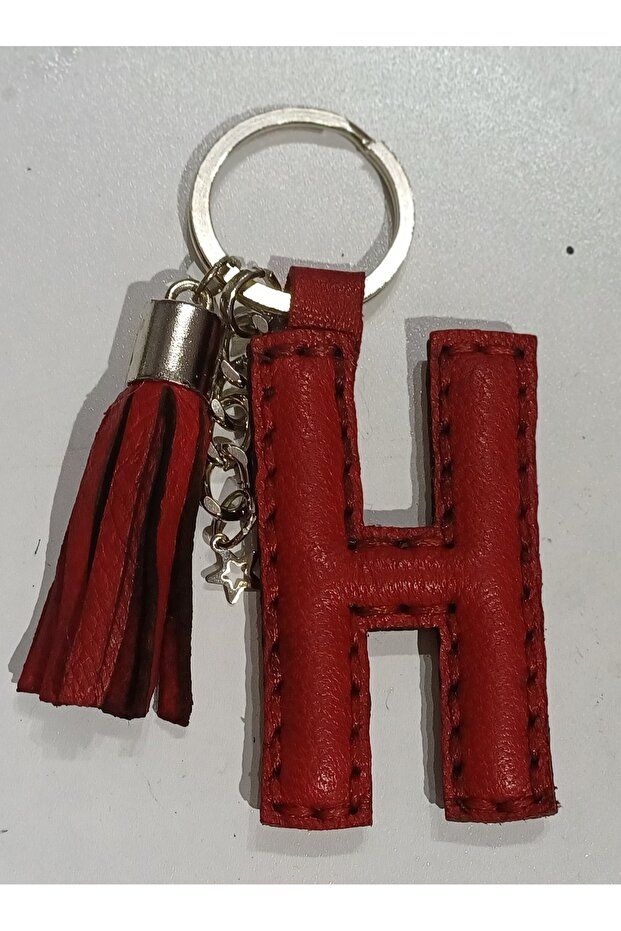 سلسلة مفاتيح من الجلد الطبيعي باللون الأحمر على شكل حرف 'H'