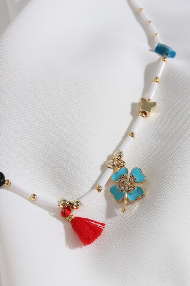 White Necklace with Clover Pendant and Blue Stars