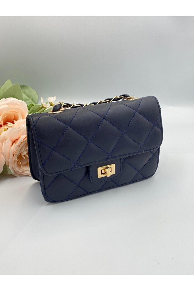 حقيبة جلدية سوداء منقوشة بالألماس - 1