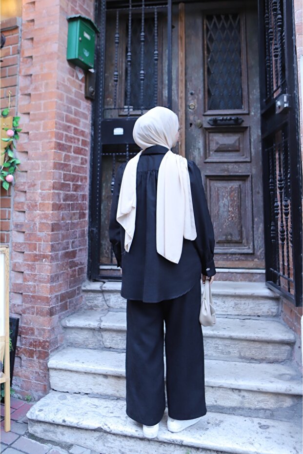 بدلة من جلد الغزال بأزرار - 5