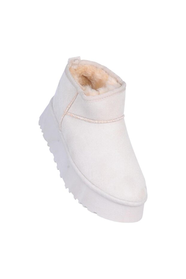 حذاء نسائي مسطح من Tinsa باللون البيج مع بطانة من الفرو