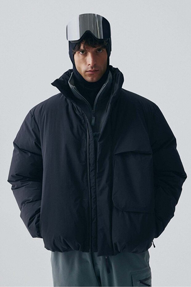 Sports puffer jacket with ThermoMove™