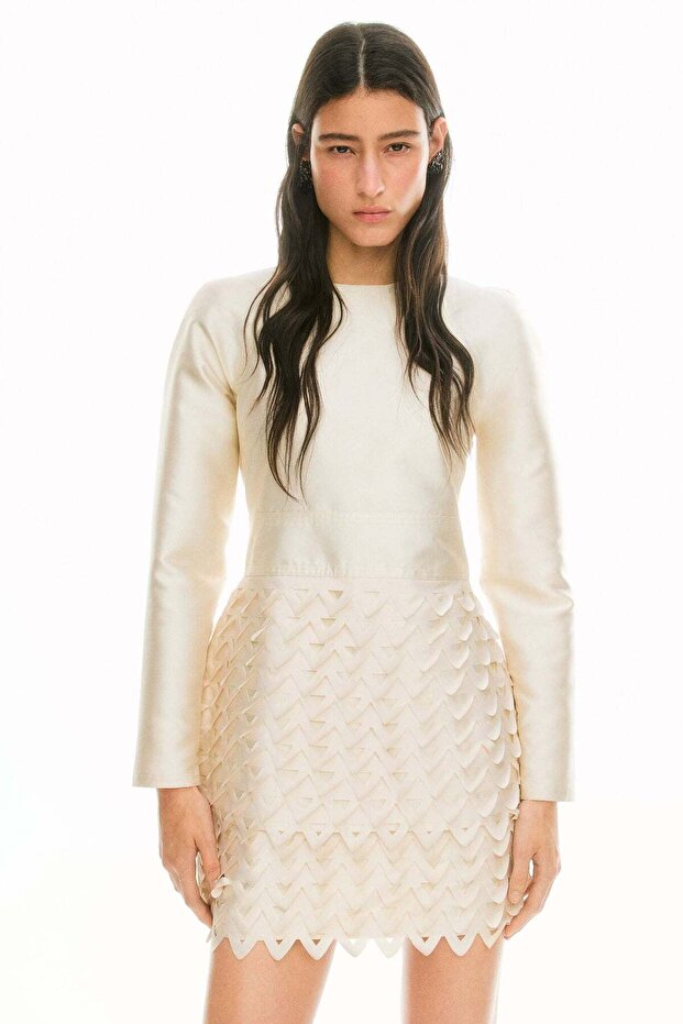 Perforated-skirt dress